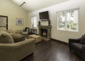 Thumbnail 21 of 28 - Clubhouse with Fireplace at Eucalyptus Grove Apartments, California, 91910